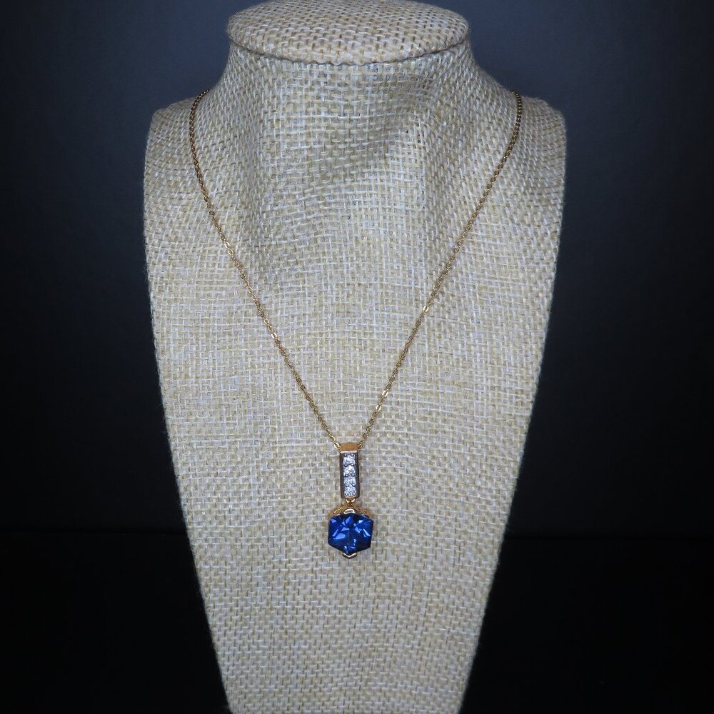 Gold Tone Necklace with Blue Stone and Clear Crystal Pendant